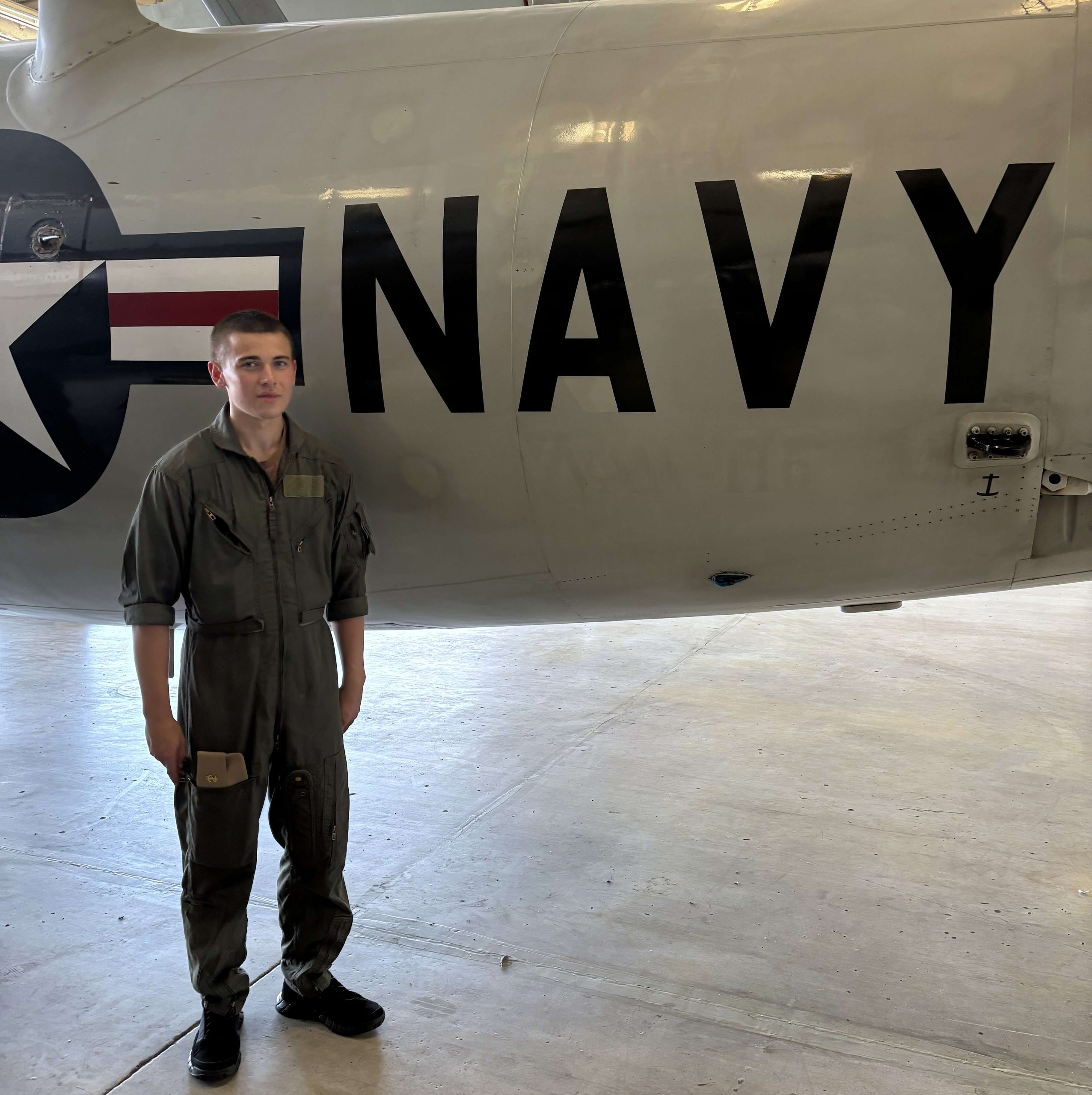 Midshipman looking out over water